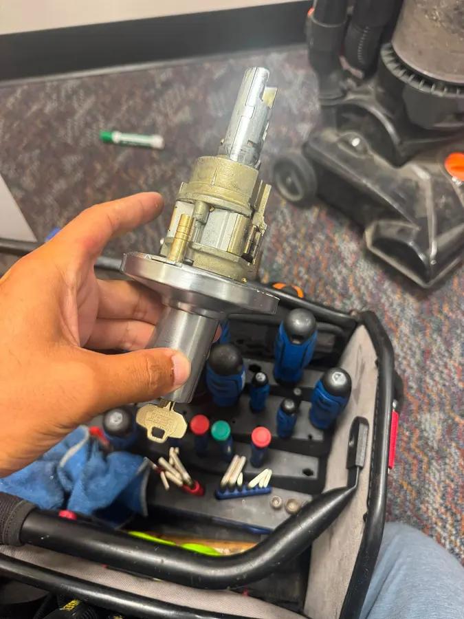 Commercial cylinder and key in hand